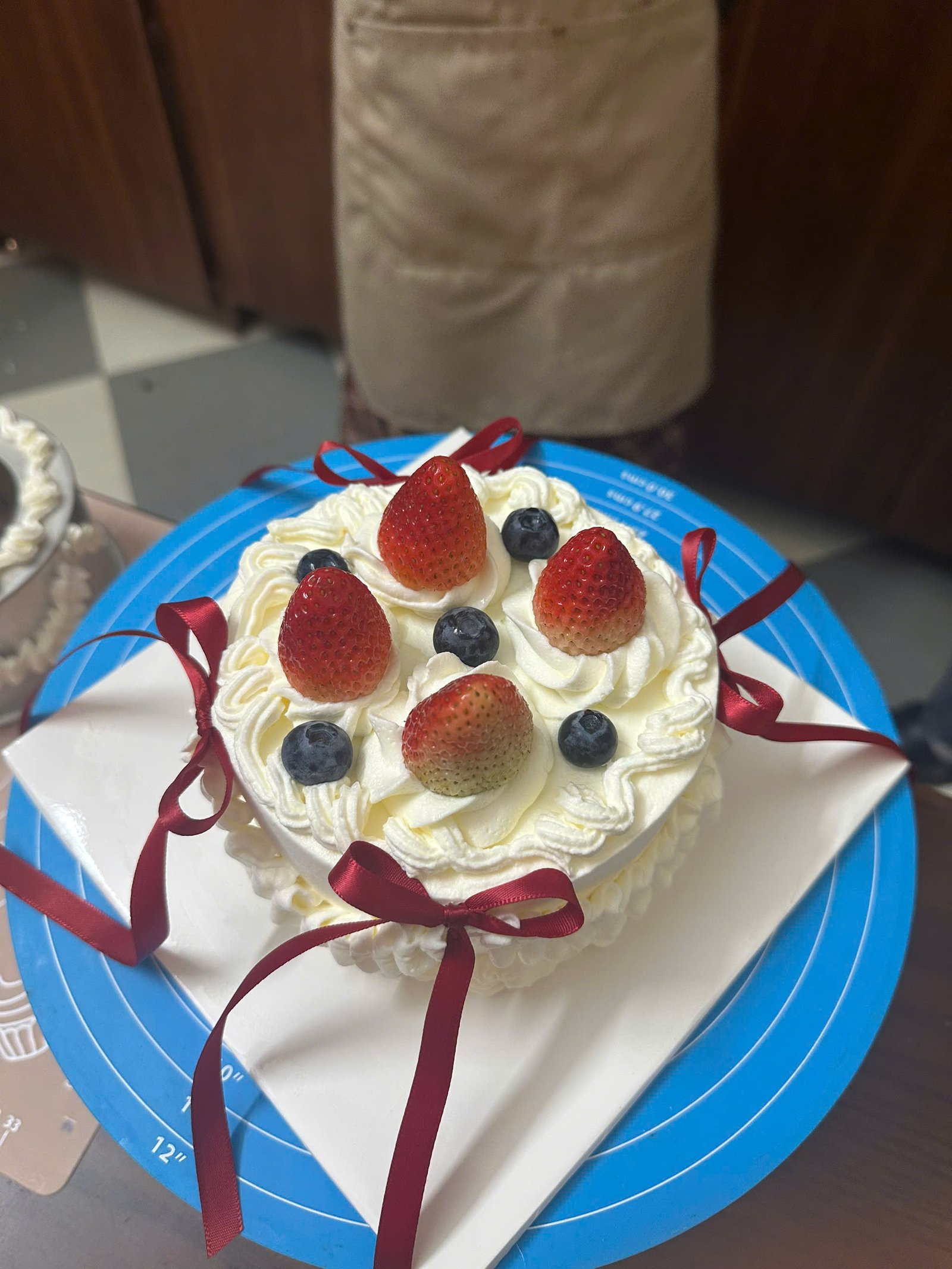 Guest's finished birthday cake ready to celebrate
