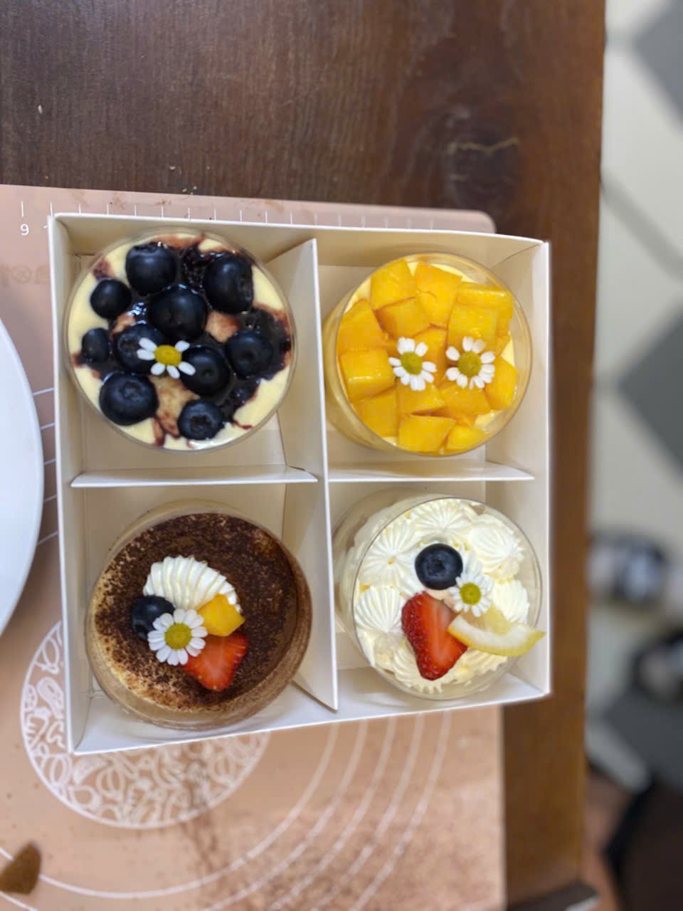 Assorted mini fruit cakes decorated during the workshop