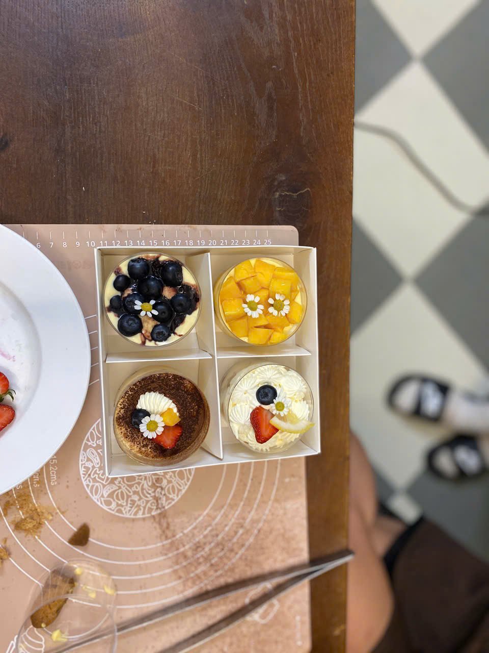 Blueberry, mango and tiramisu mini cakes ready to enjoy