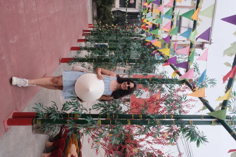 Guest in Ao Dai at Hanoi Train Street — photo 10