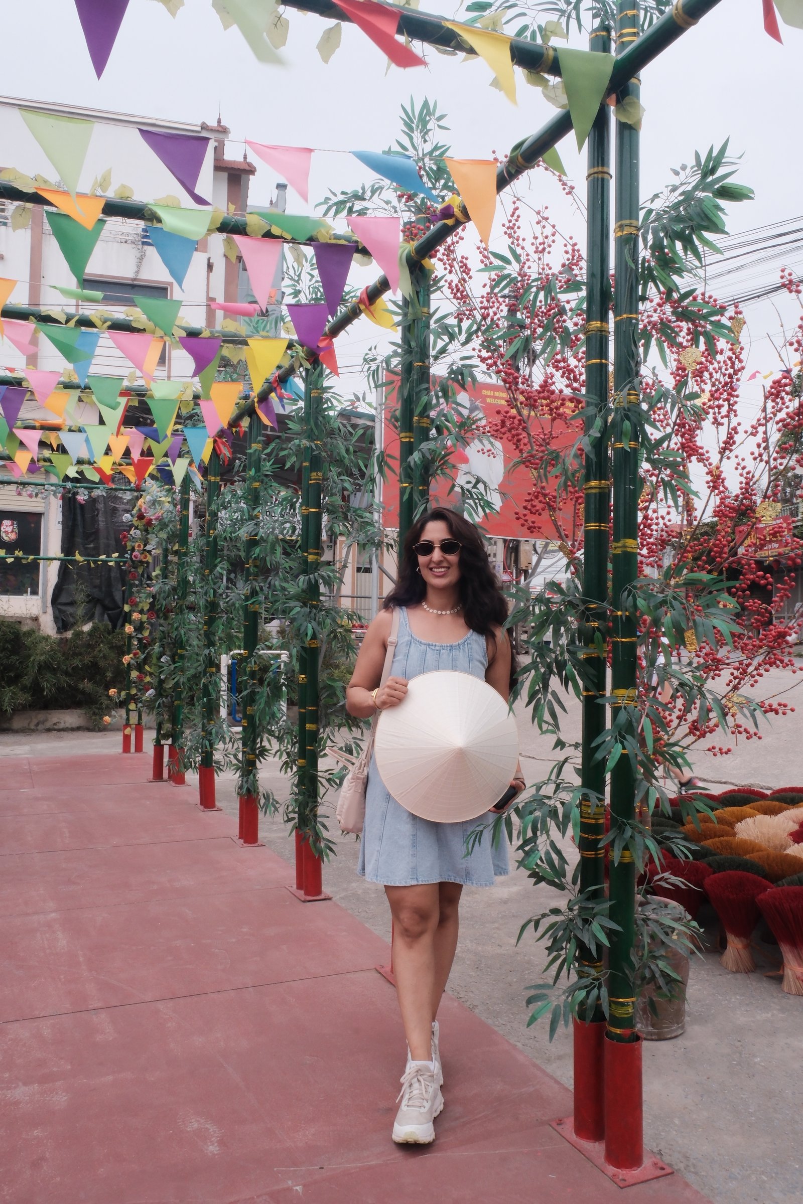 Guest in Ao Dai at Hanoi Train Street — photo 10