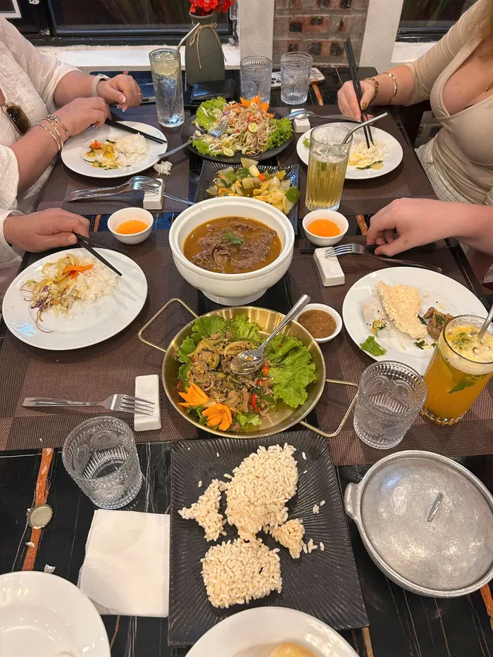 A spread of Vietnamese dishes on the table