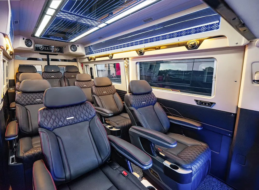Reclining leather seats and a panoramic sunroof inside the minivan