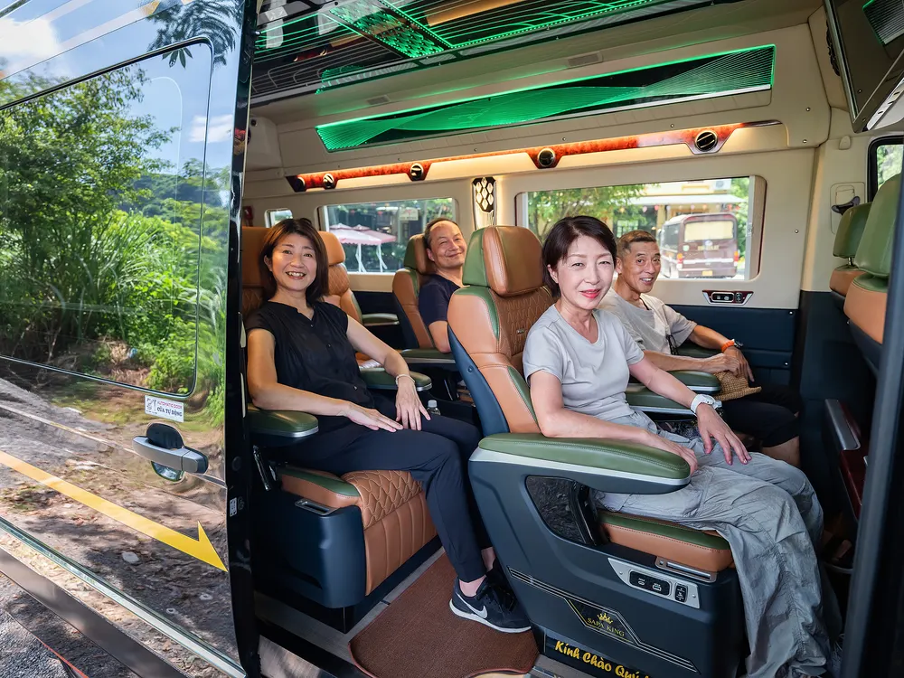 Guests seated in the minivan on the way to Ninh Binh