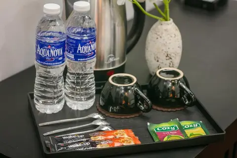 Family Suite: kettle, bottled water, cups and tea on the tray